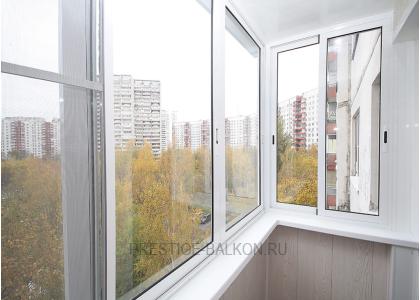 Холодное остекление балкона профилем Provedal с отделкой стен и потолка ламинированными панелями в Королеве