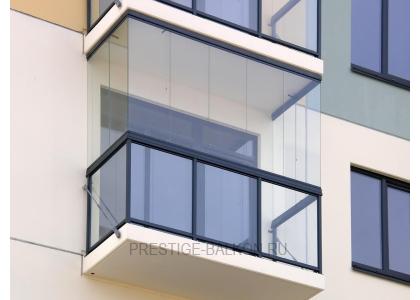 Безрамное остекление балкона с внешней отделкой в Королеве